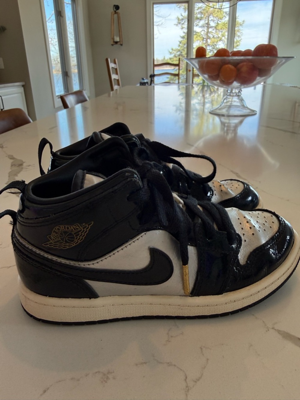 Jordan Kids Black and Silver High-Top Sneakers with Gold Accent